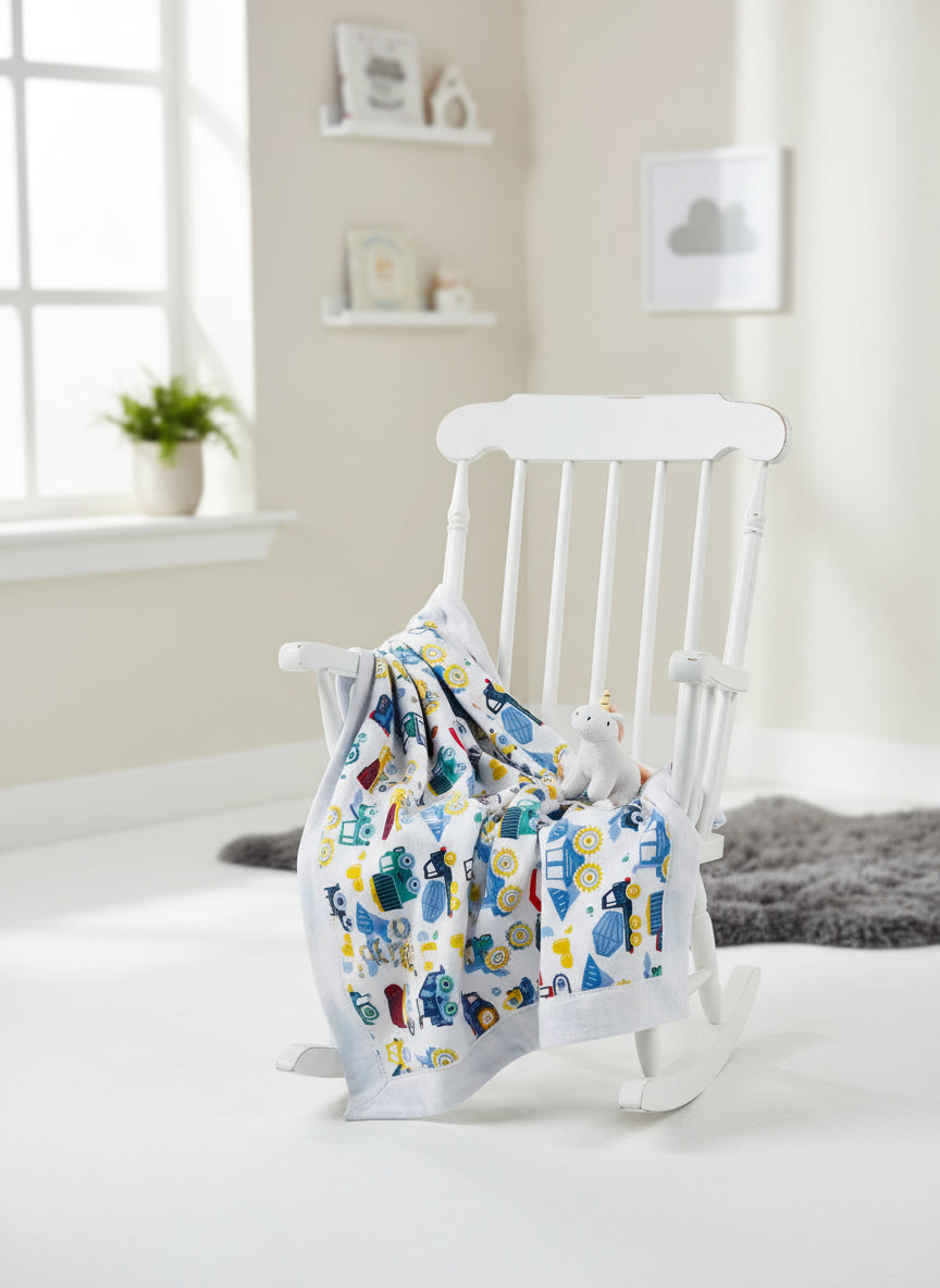 Baby blanket with colorful vehicle pattern and a soft white border and back